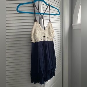 Gorgeous crochet style top, braided leather straps, gauzy navy blue 🤍